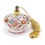 Bohemian white overlaid cranberry glass atomiser hand painted with flowers in the style of Moser,