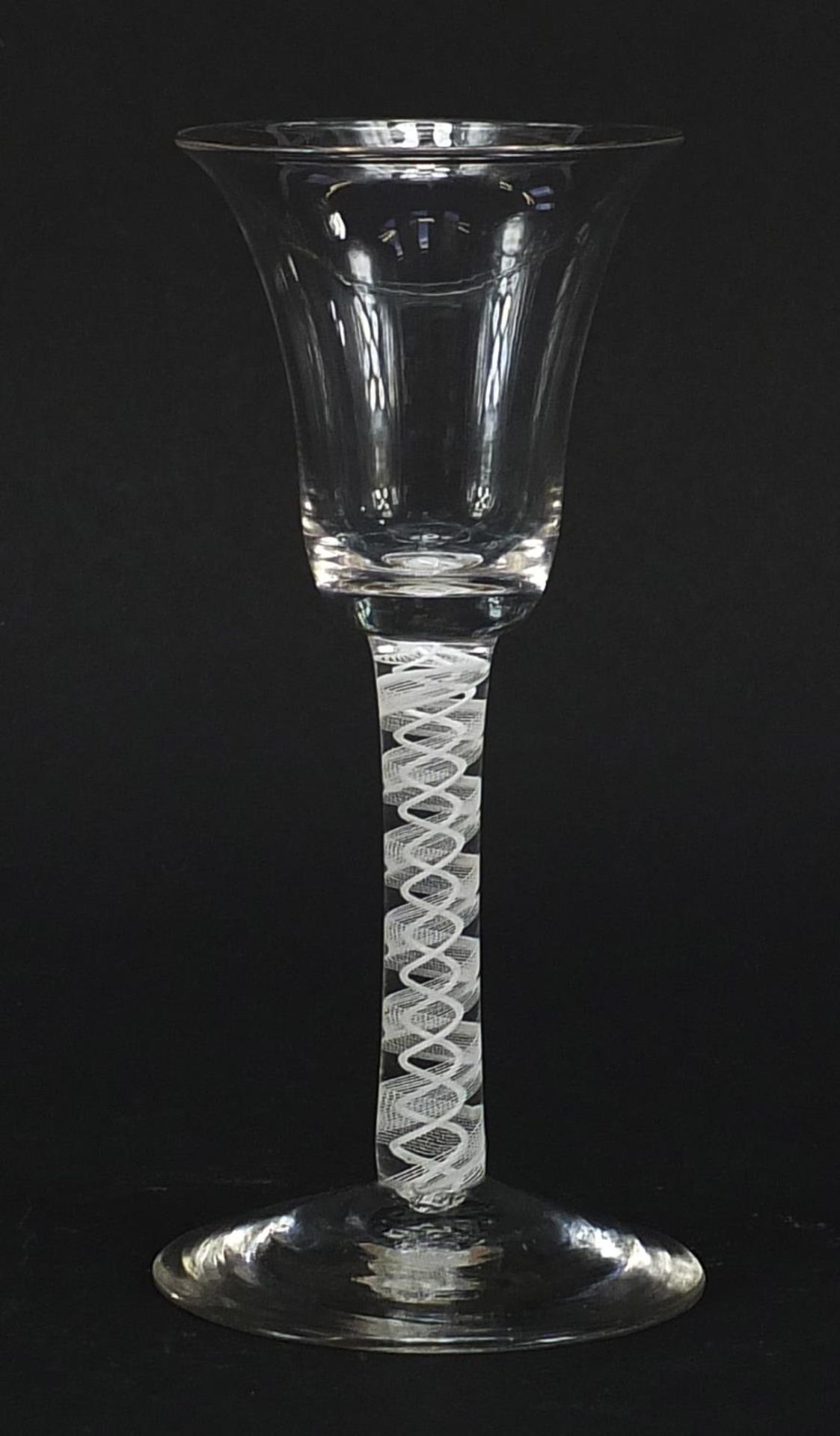 18th century wine glass with bell shaped bowl and multiple opaque twist stem, 16cm high