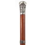 Malacca walking stick with unmarked silver mounts including Chinese pommel embossed with figures,