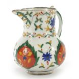 Turkish Kutahya pottery water jug hand painted with flowers, 12.5cm high