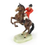 Beswick huntsman on rearing horse, numbered 868, 24cm high
