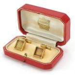 Pair of 1970s 18ct gold Cartier cufflinks housed in a silk and velvet lined fitted case, 1.2cm x 1.