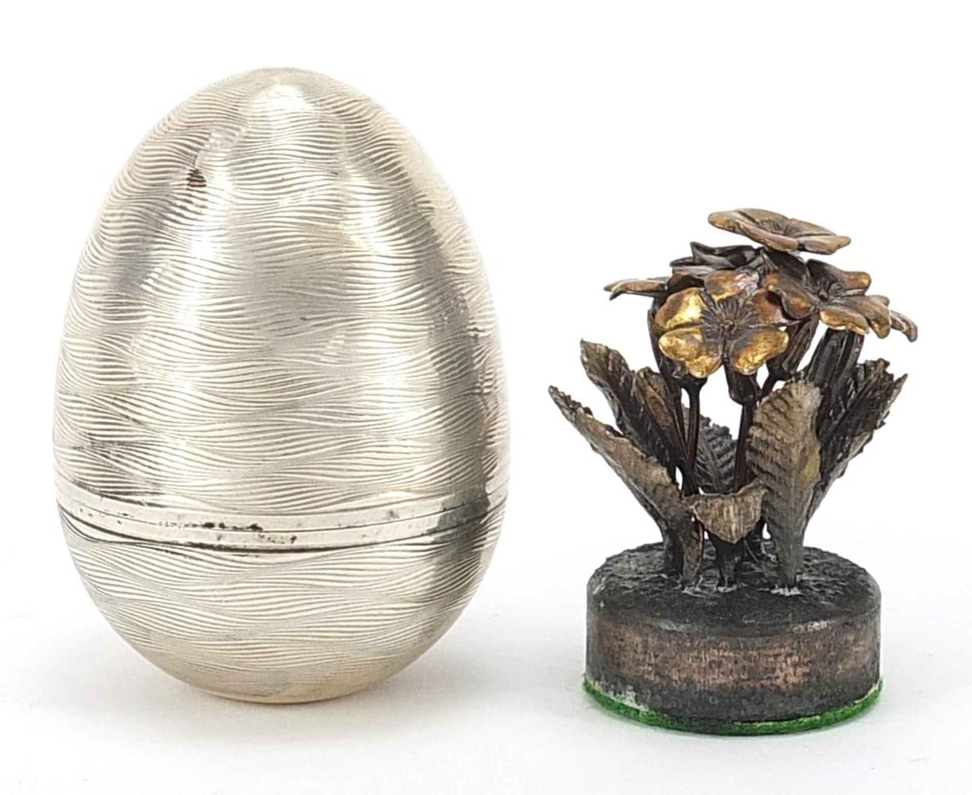 Nicholas Plummer, Elizabeth II silver surprise egg housing a floral posy in the manner of Stuart - Image 2 of 5