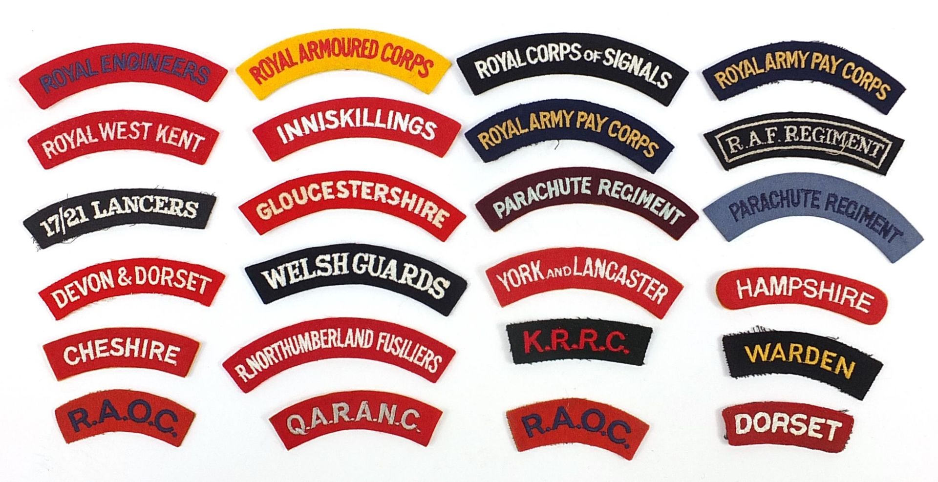 Military interest shoulder titles including Welsh Guards, Parachute Regiment, Royal Army Pay Corps