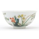 Chinese porcelain bowl hand painted in the famille rose palette with flowers, six figure iron red