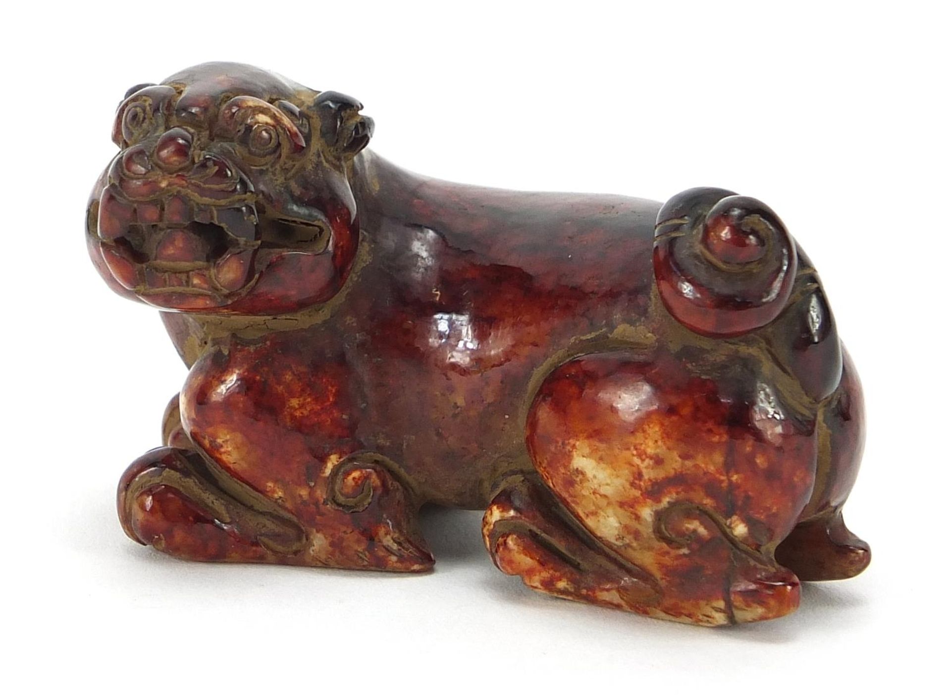 Chinese red stone carving of a mythical animal, 6.5cm in length