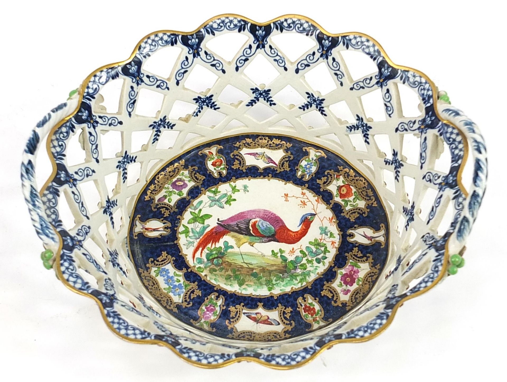 18th/19th century porcelain basket hand painted with birds of paradise and insects in the style of