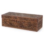 Chinese Canton sandalwood casket profusely carved with figures amongst pagodas, 8cm H x 25cm W x