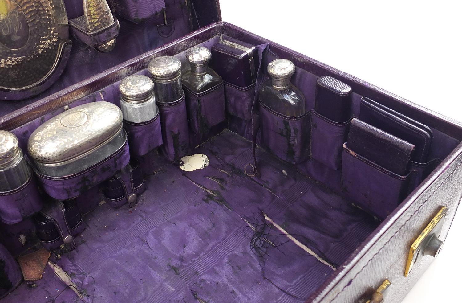 Edwardian purple leather travelling vanity case with silver mounted items including brushes, - Image 4 of 8