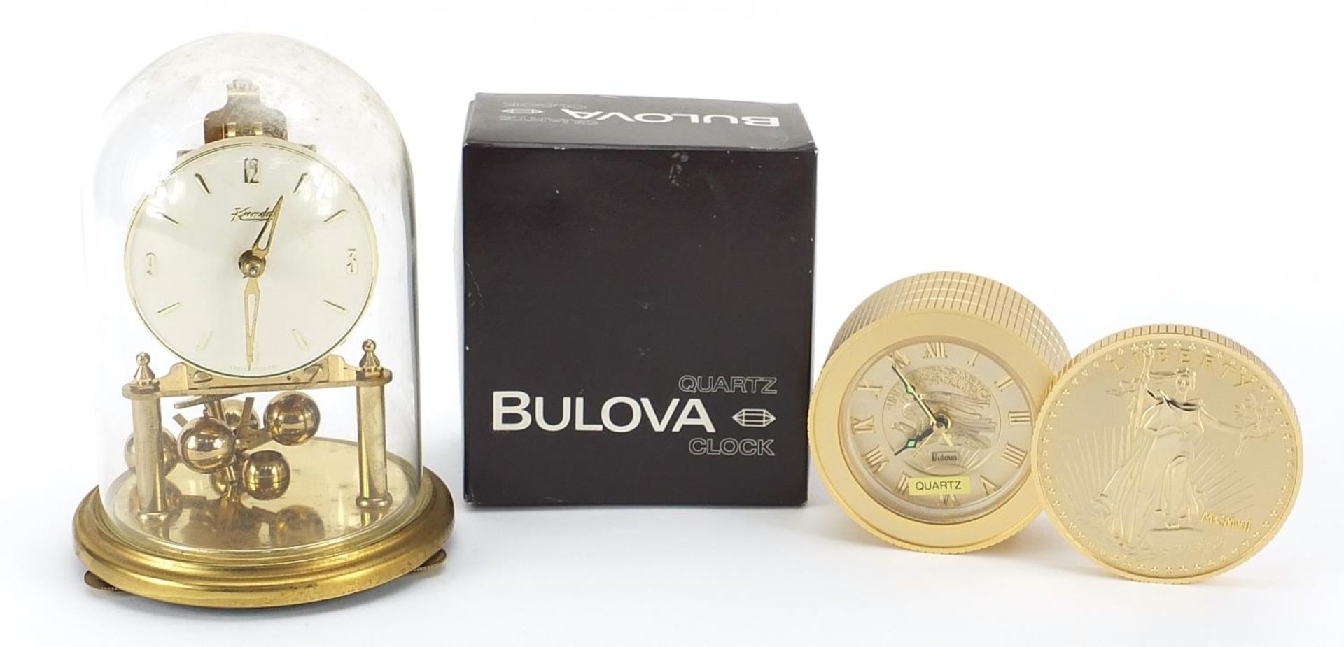 Kundo anniversary clock and Bulova quartz Liberty coin design desk clock, the largest 18cm high