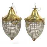 Pair of ornate gilt brass acorn chandeliers with swags and bows, 56cm high