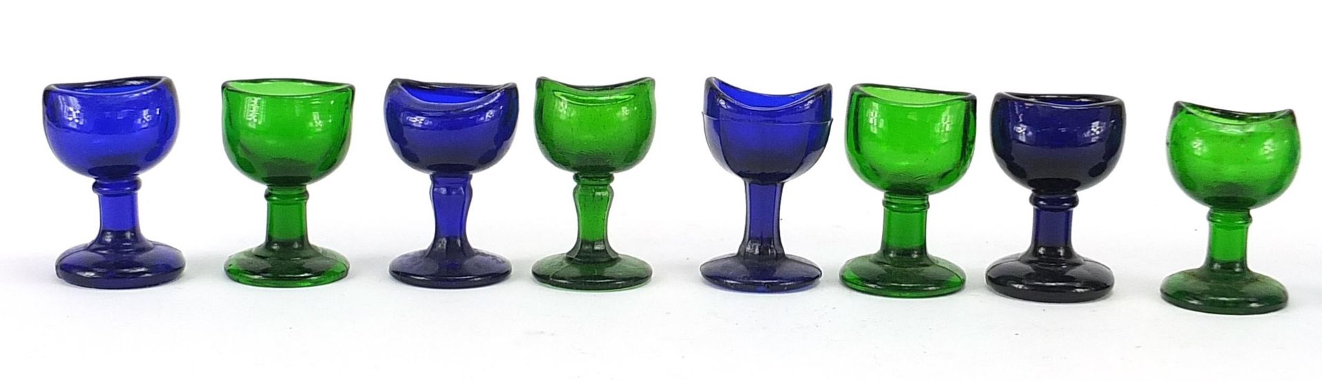 Eleven antique glass eye baths including six Bristol blue examples, each approximately 7.5cm high - Image 2 of 3