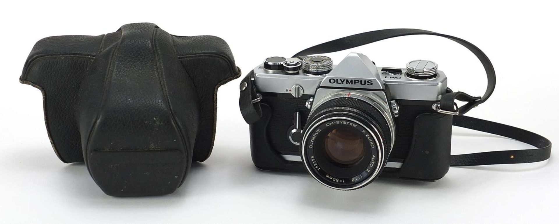 Olympus OM-1 camera with 50mm lens