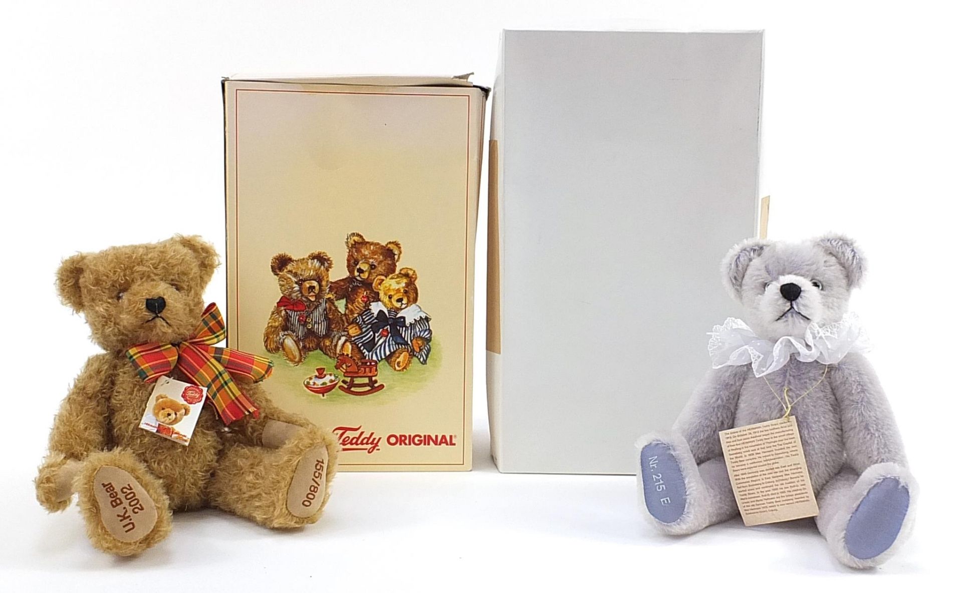 Two Hermann teddy bears with jointed limbs, one with box, the largest 36cm high
