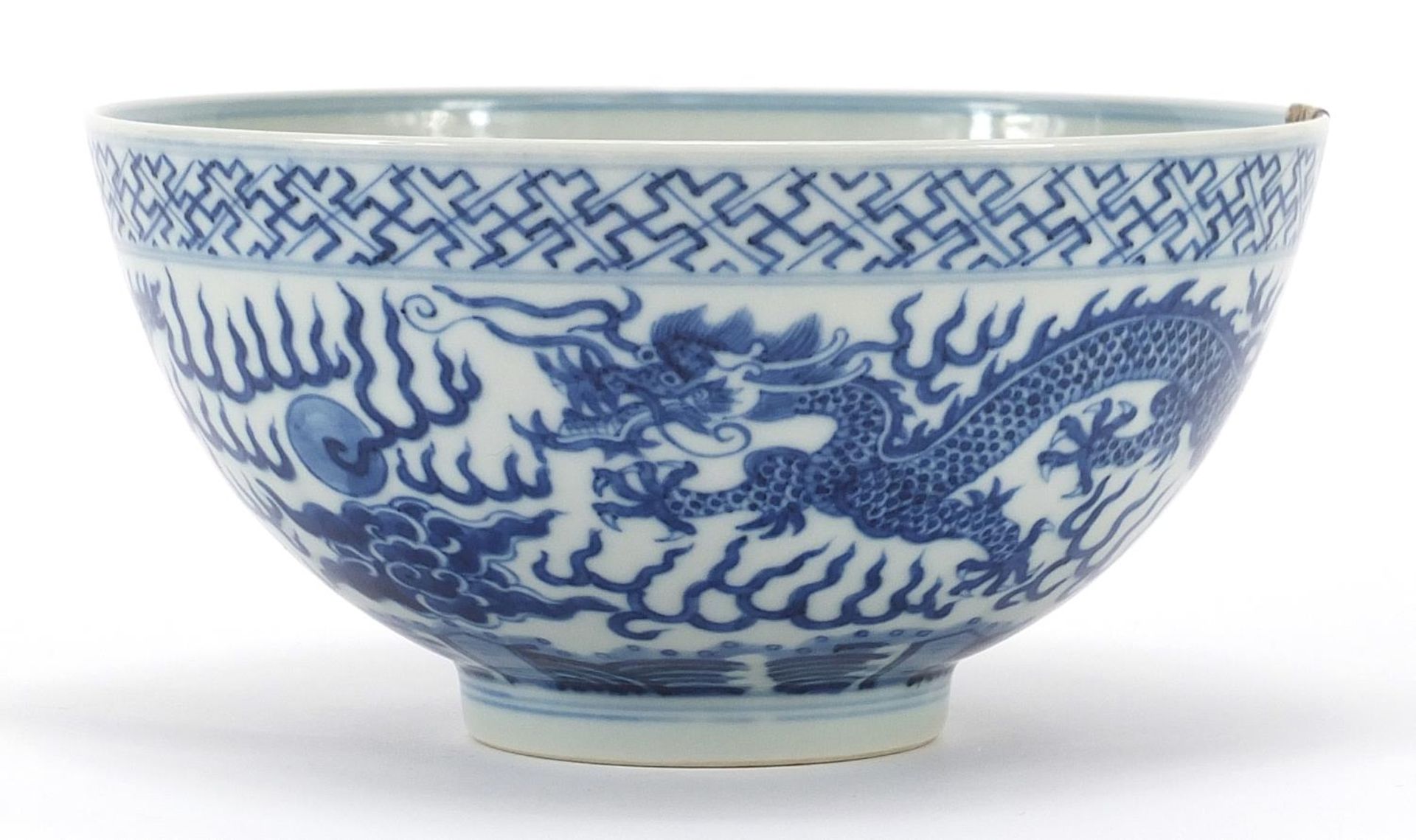 Chinese blue and white porcelain bowl hand painted with a dragon chasing a flaming pearl amongst - Image 2 of 5