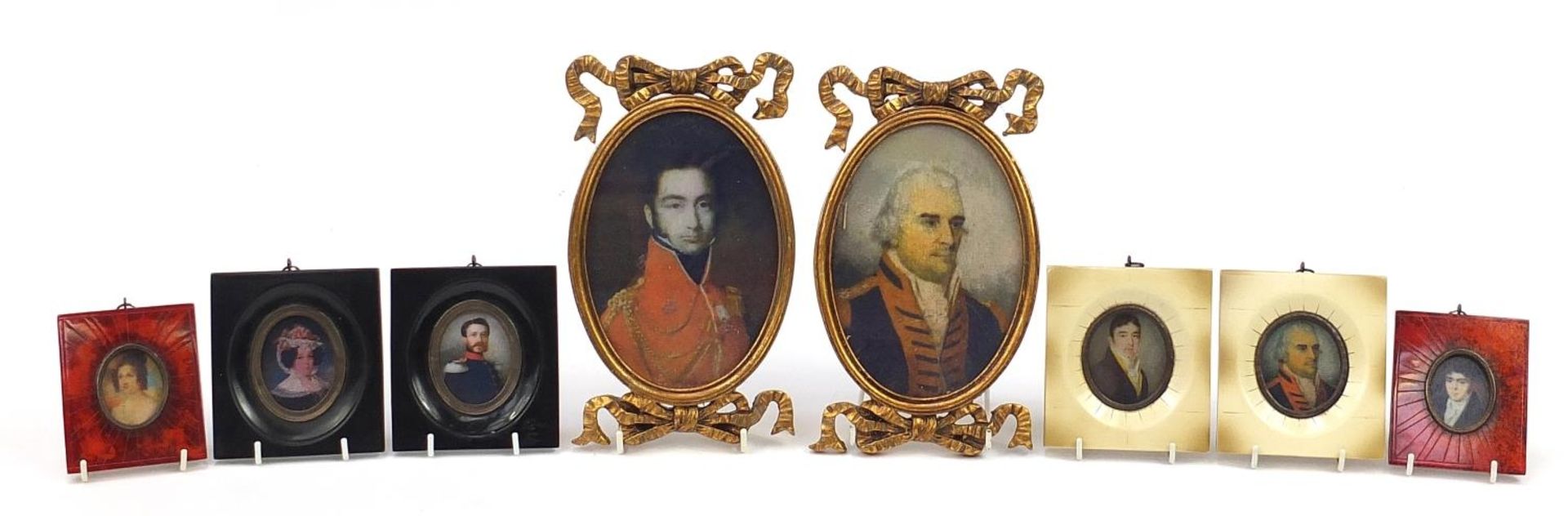 Four pairs of portrait miniatures including giltwood bow design frames, the largest 24cm high