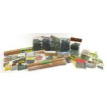 Model railway landscape accessories in packets including grass, trees, sand and cork