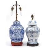 Two Chinese blue and white porcelain vase and cover table lamps with hardwood stands, the largest