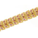 18ct gold and ruby leaf design link bracelet housed in a Gioiellieri Messina box and J C P valuation