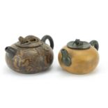 Two Chinese Yixing terracotta teapots including a marbleised example with lizard knop, the largest