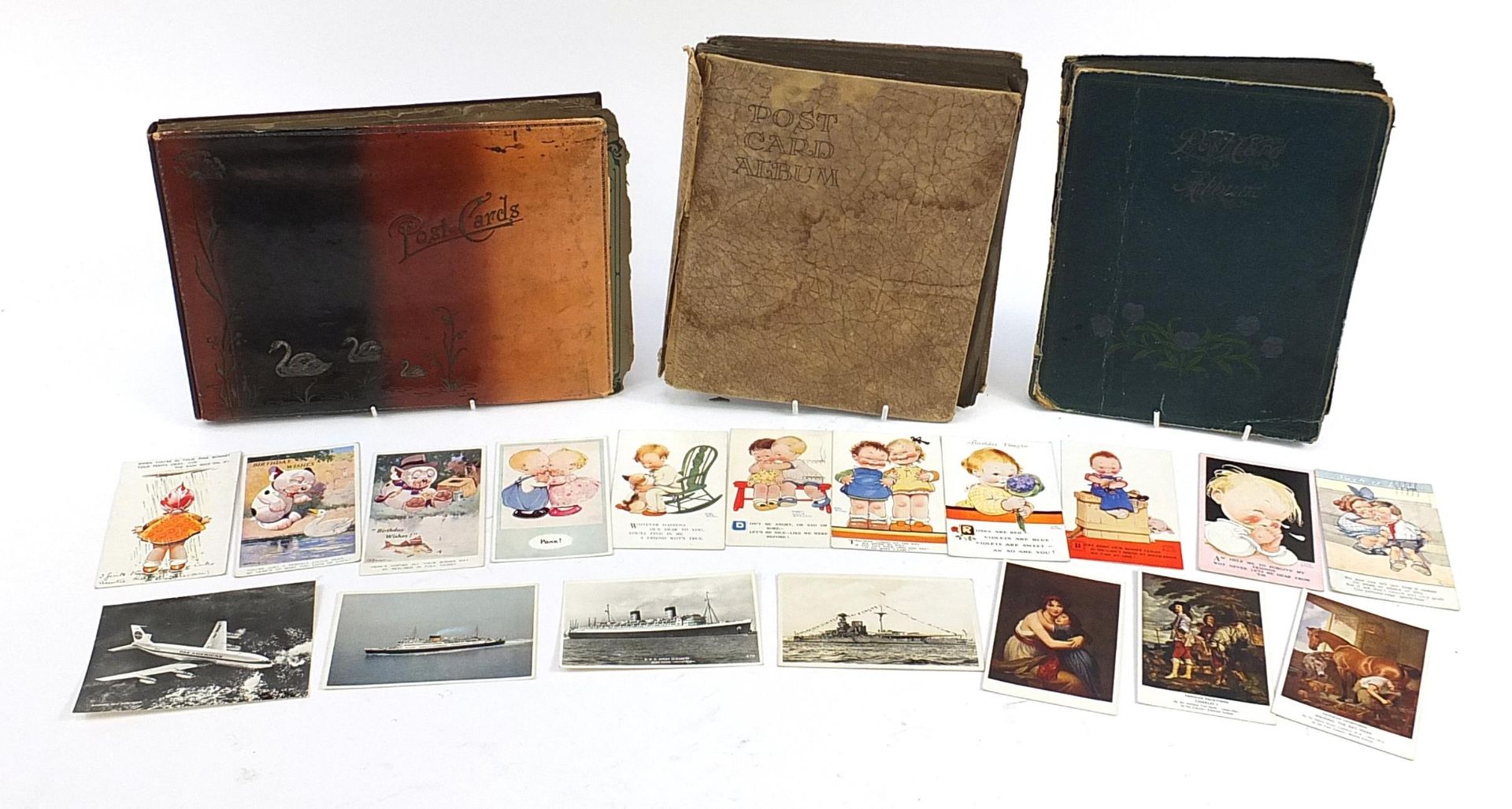 Collection of postcards predominantly arranged in albums including ships, Mabel Lucie Attwell and