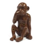 Louis Vuitton style seated chimpanzee, 38cm high