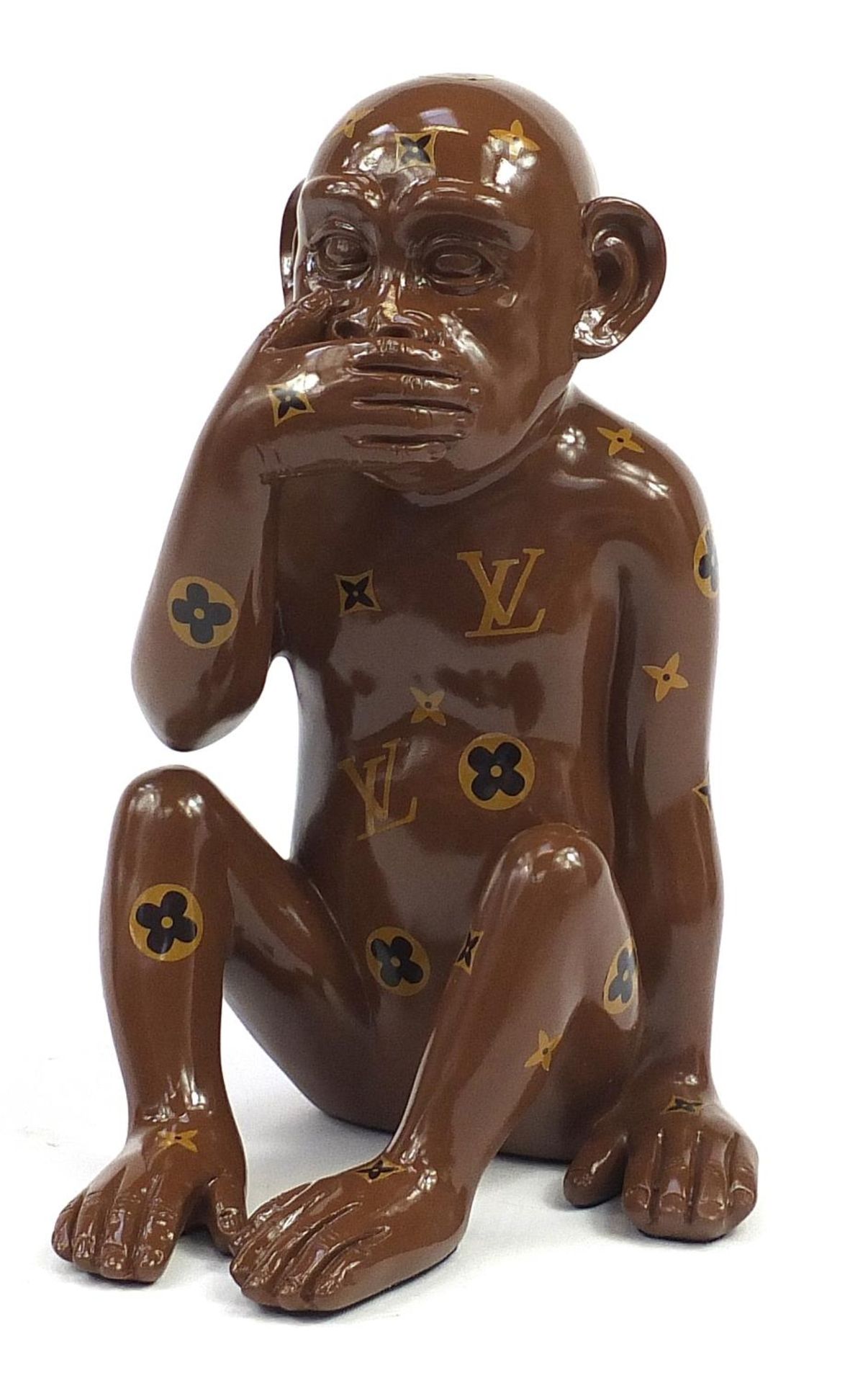 Louis Vuitton style seated chimpanzee, 38cm high