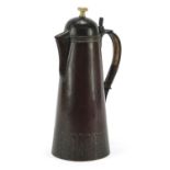 Arts & Crafts beaten patinated brass jug, impressed 294 to the base, 25.5cm high