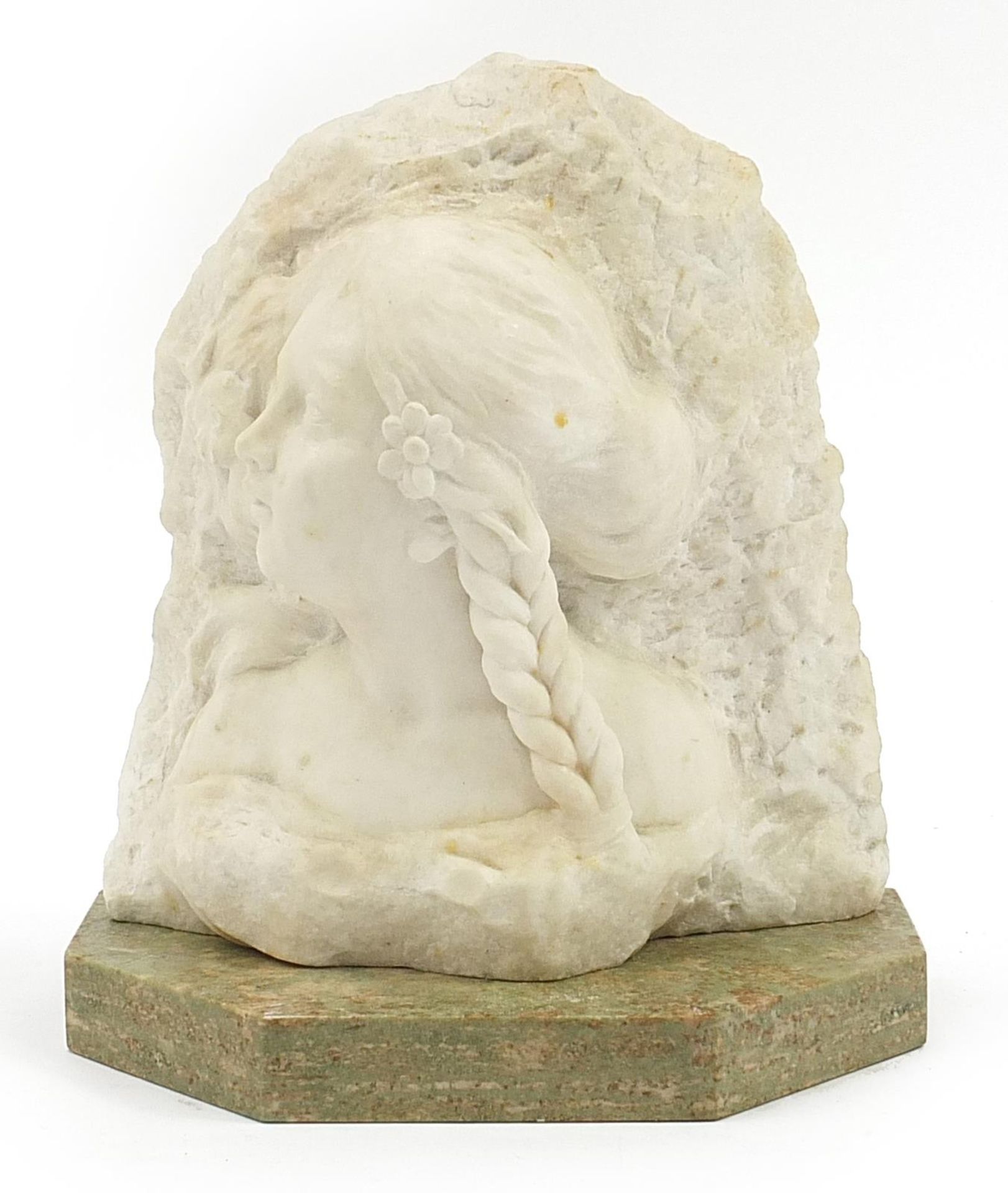 19th century alabaster carving of a young female raised on a green marble base with canted