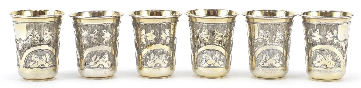 Vasky Aleksandrovich Petrov, Set of six Russian silver gilt engraved liqueur cups, Moscow 1885,