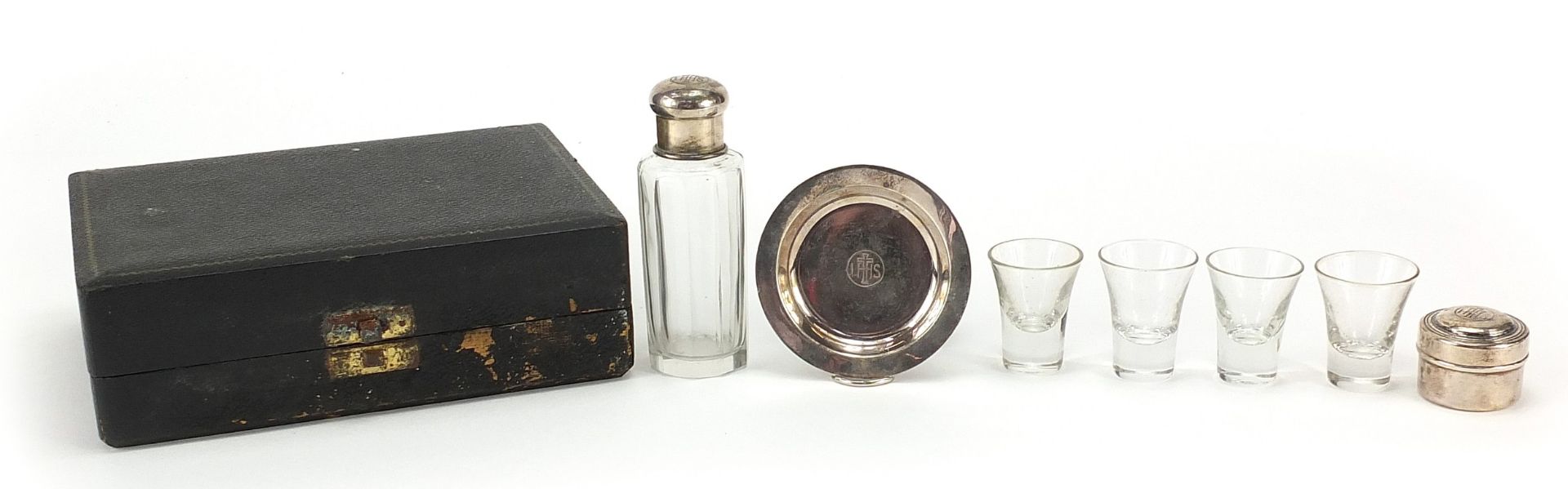 Silver plated travelling holy communion set housed in a fitted case, the bottle 10cm high