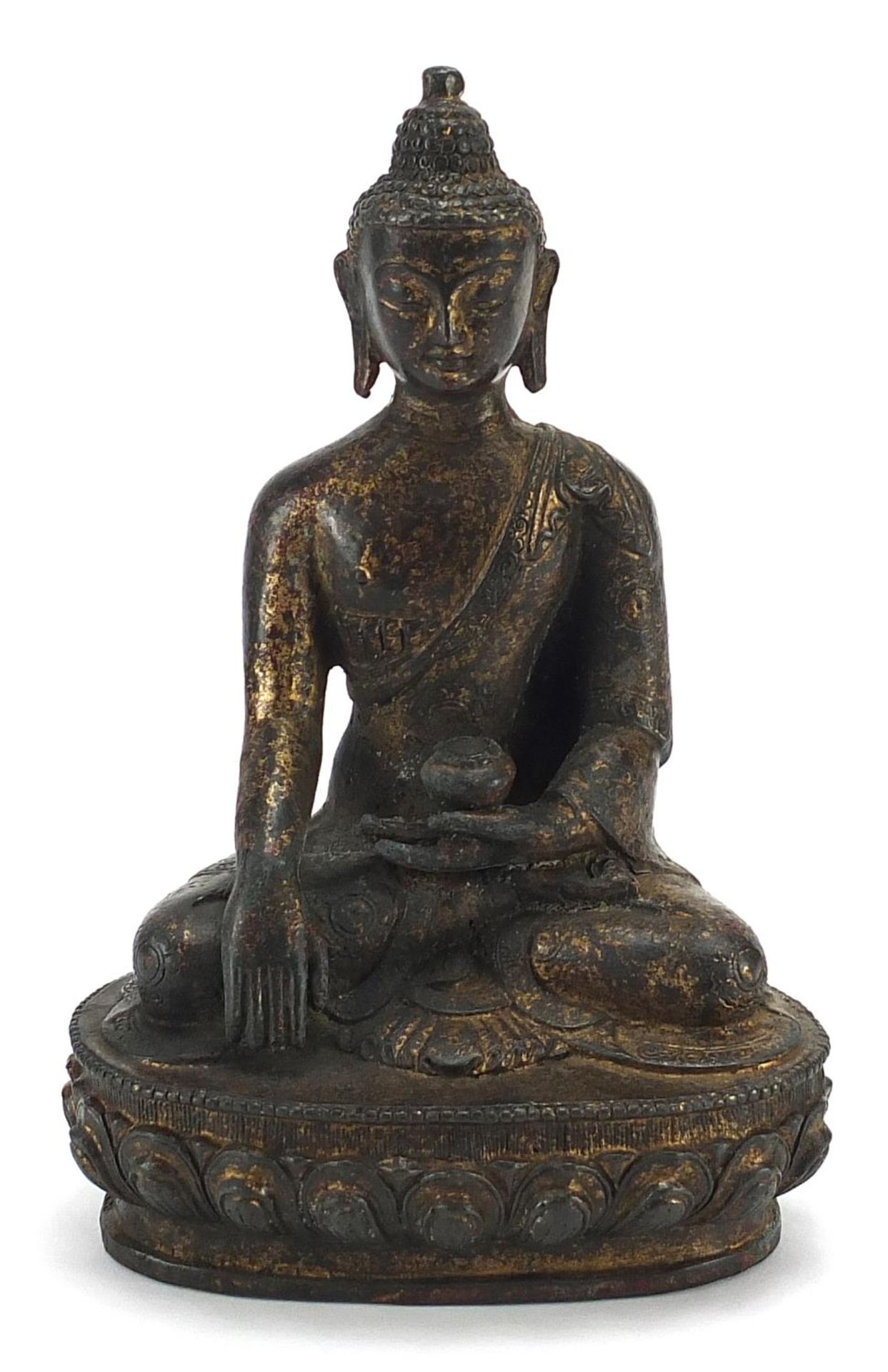 Chino Tibetan patinated bronze figure of a deity, 20cm high