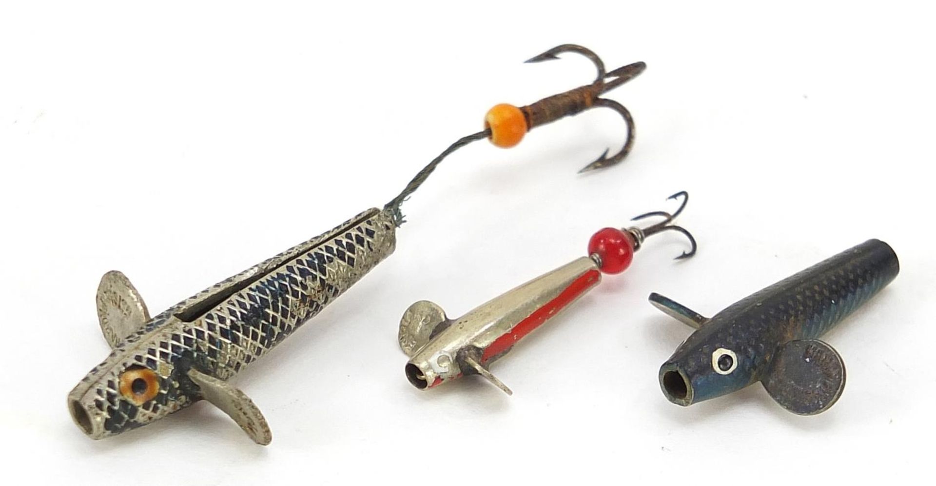 Three vintage Hardy Bros metal fishing lures, the largest 6cm in length overall