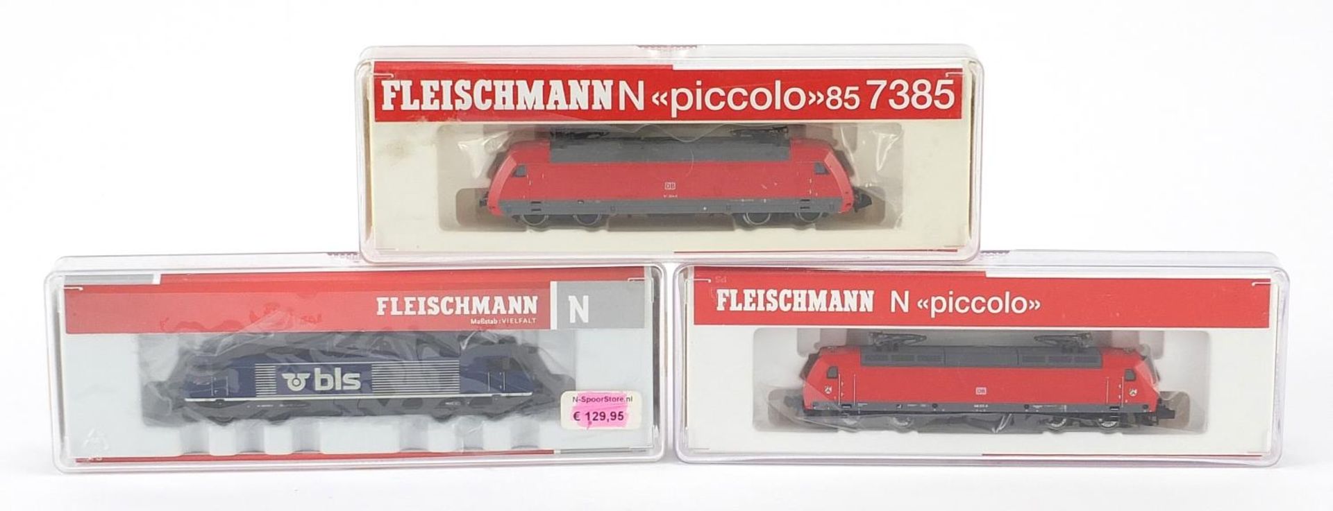 Three Fleischmann N gauge model railway locomotives with cases, numbers 7324, 7385 and 731304