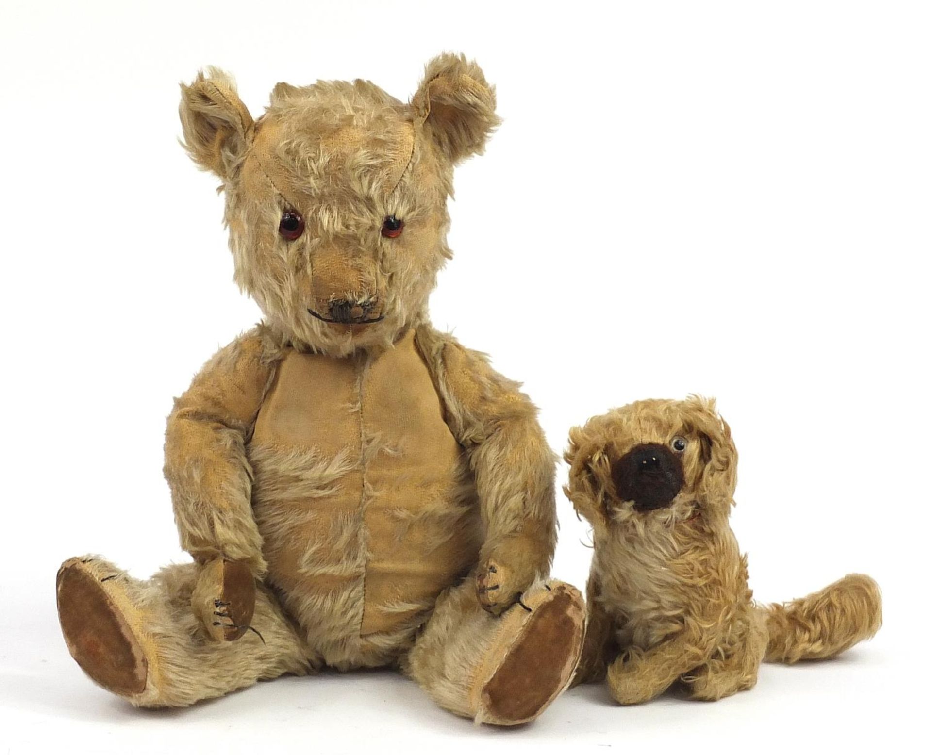 Large Vintage golden teddy bear with articulated limbs and a straw filled seated dog, the largest