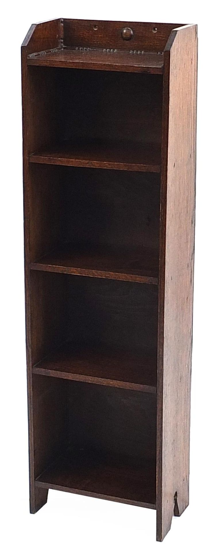 Manner of Liberty & Co, Arts & Crafts oak five shelf open bookcase, 106cm H x 30.5cm W x 19cm D