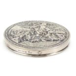 Danish silver plated compact, the hinged lid embossed with merry figures, 8cm in diameter