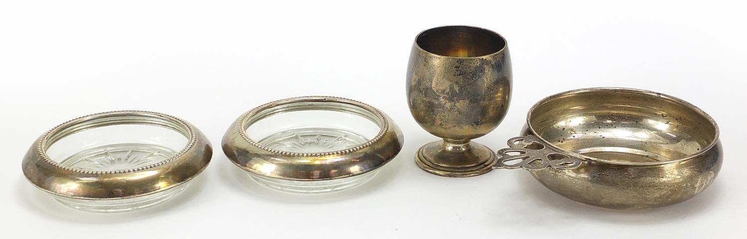 Sterling silver porringer, egg cup and pair of glass coasters with silver mounts, the largest 14cm - Image 2 of 4