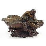 Patinated bronze centrepiece in the form of and Art Nouveau female surrounded by lily pads, 23.5cm