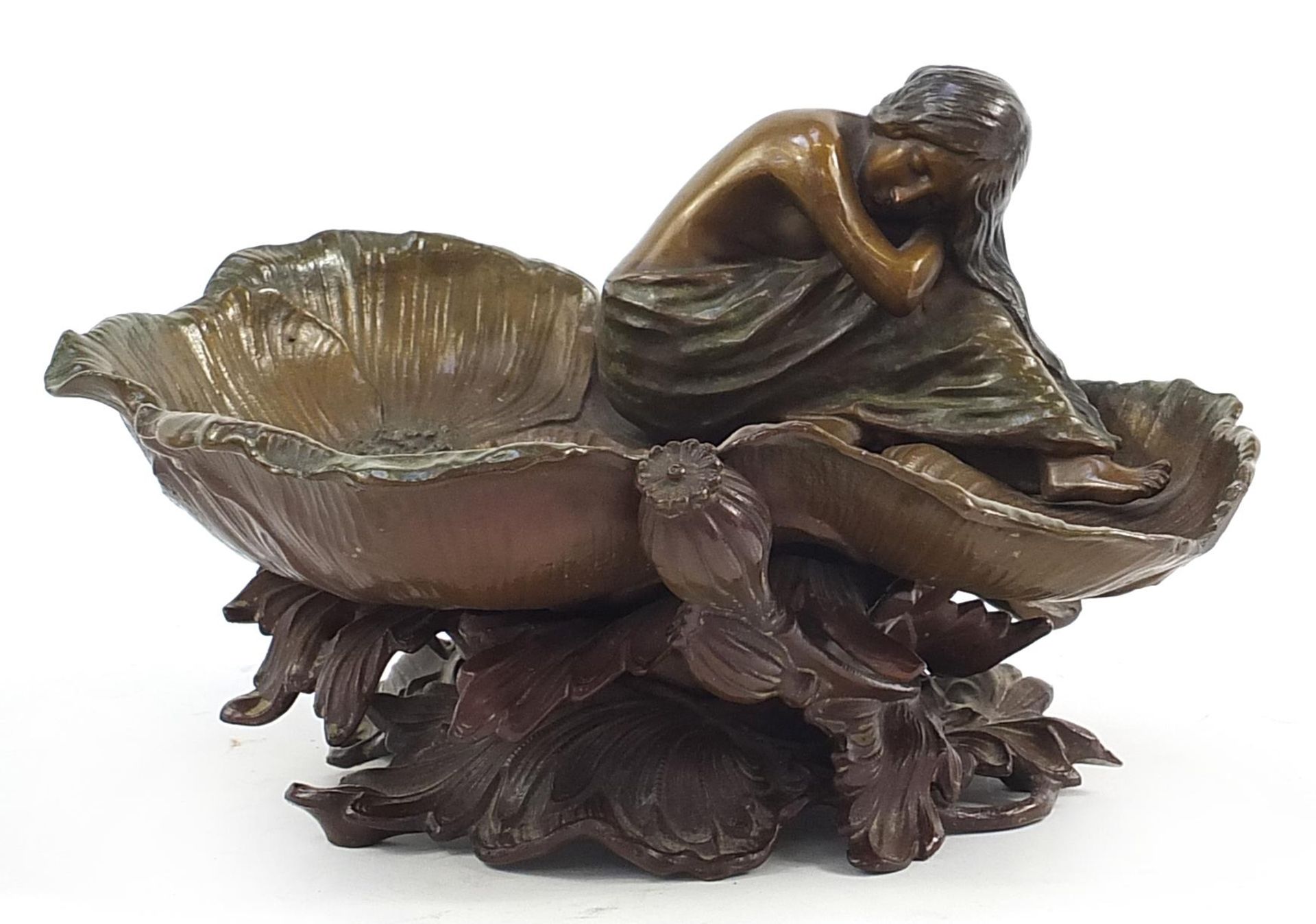 Patinated bronze centrepiece in the form of and Art Nouveau female surrounded by lily pads, 23.5cm