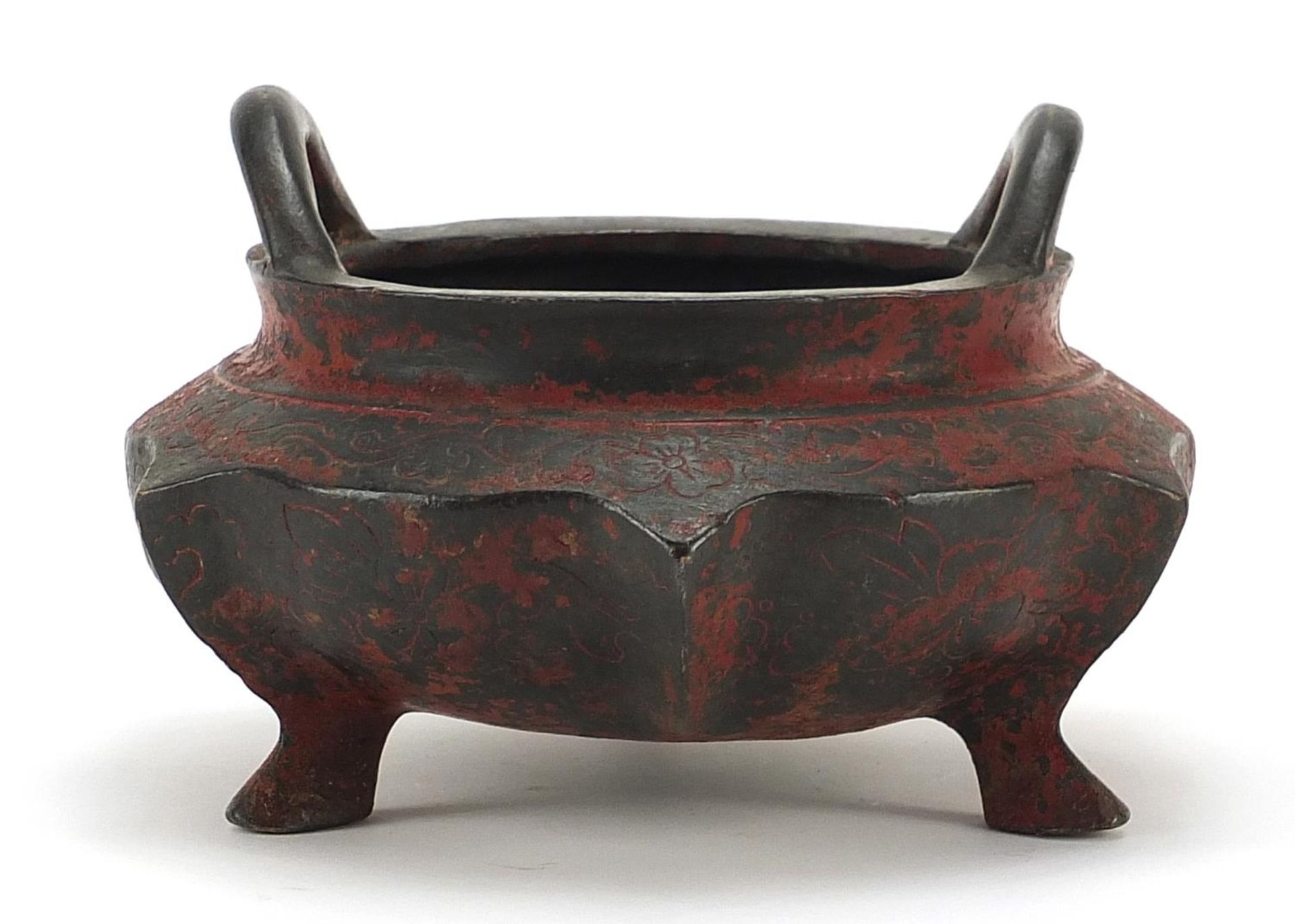 Chinese lacquered patinated bronze tripod censer with twin handles, four figure character marks to