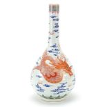 Chinese porcelain vase hand painted in iron red with a dragon chasing a flaming pearl amongst