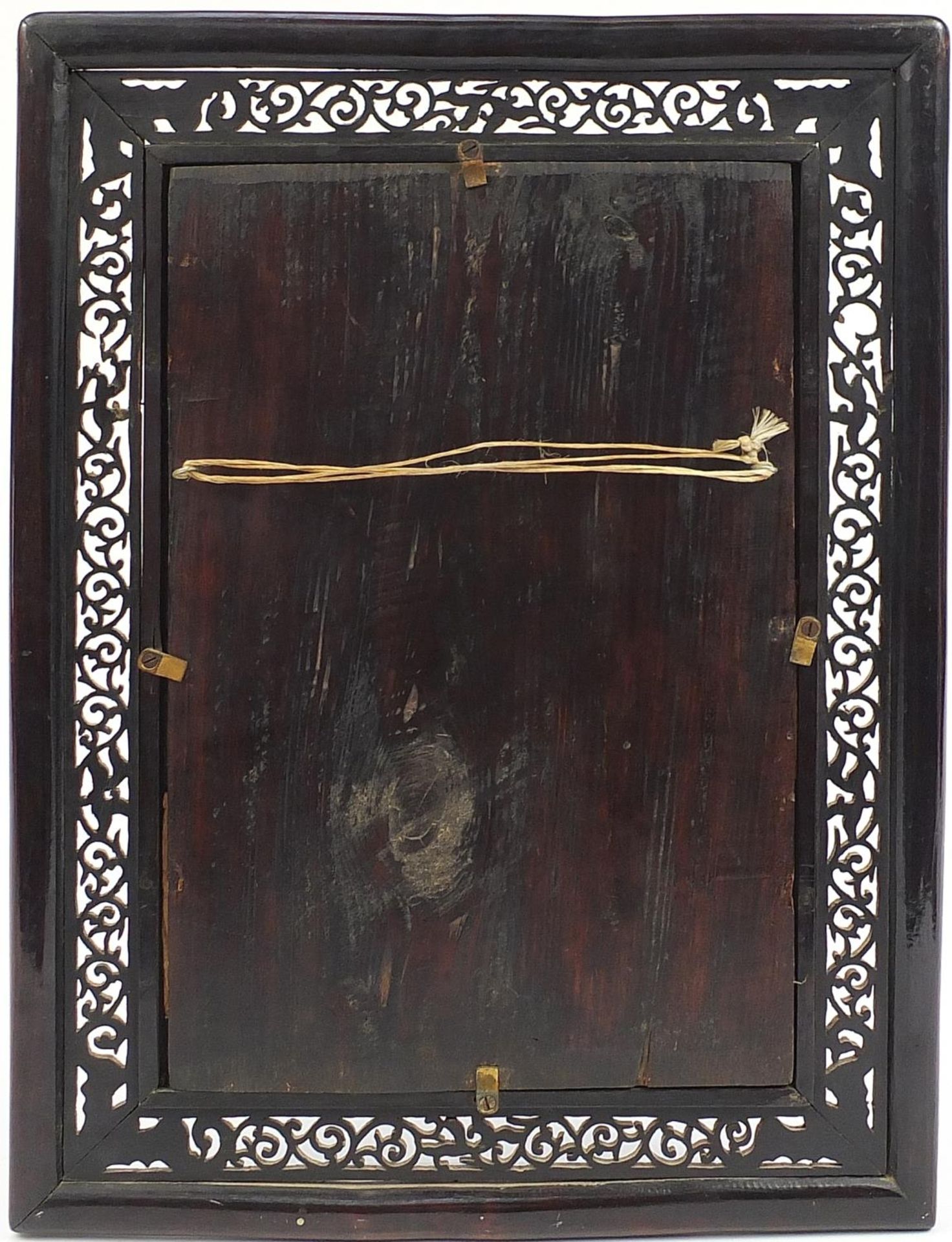 Chinese bronze panel decorated with a dragon, housed in a hardwood frame carved with bats, overall - Image 2 of 2