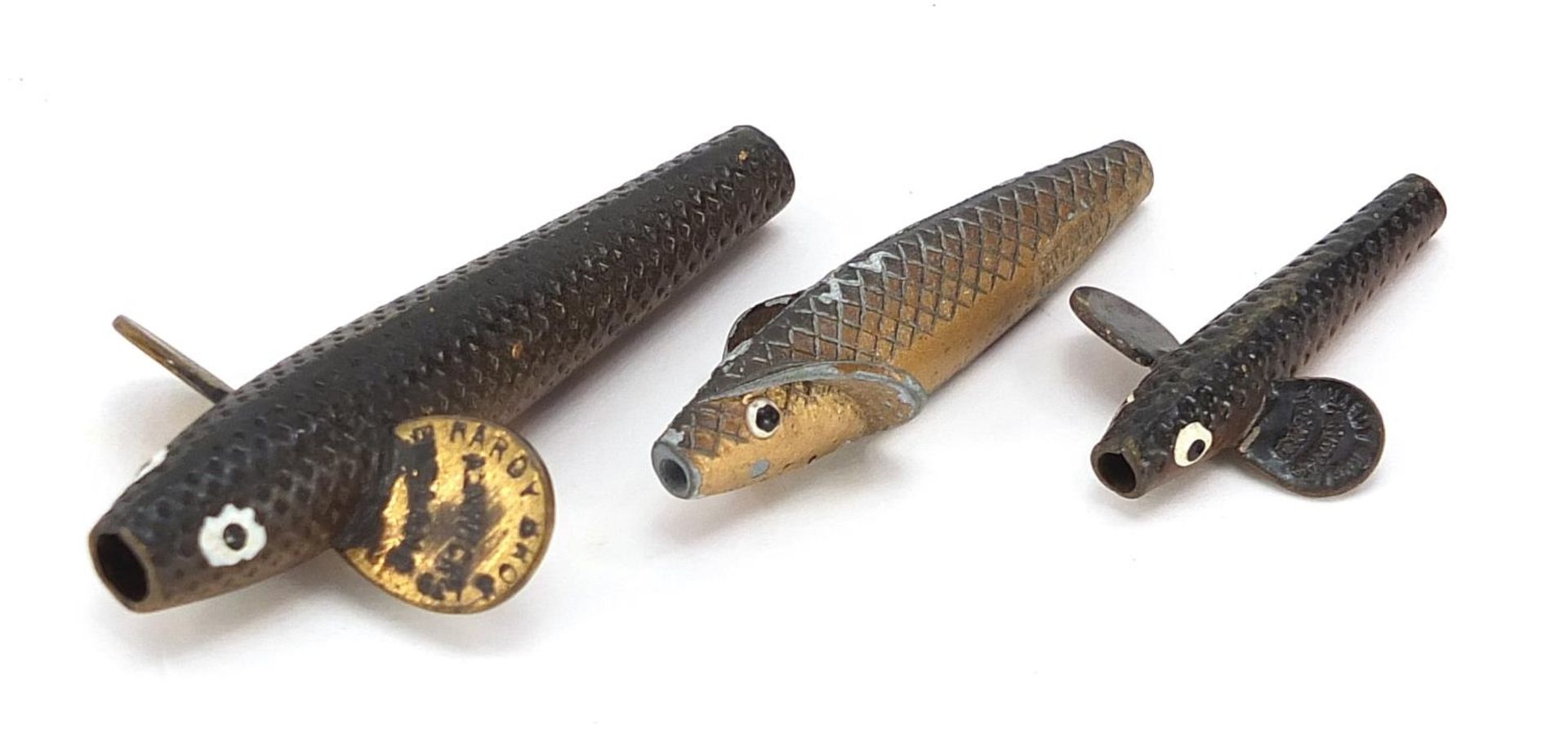 Three vintage Hardy Bros metal fishing lures, one numbered 81261, the largest 6.5cm in length