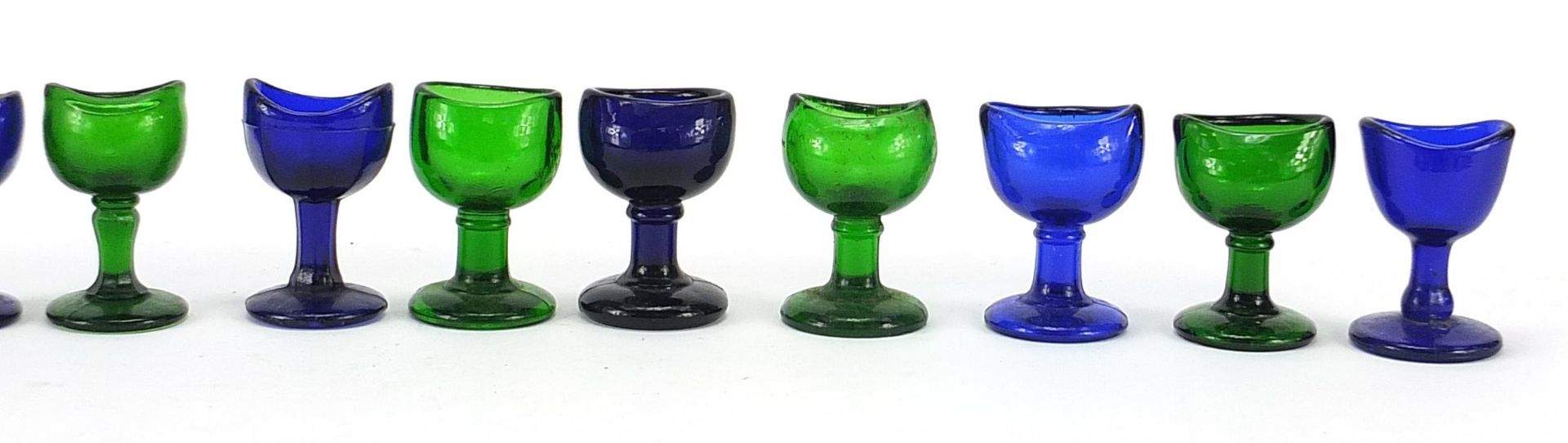 Eleven antique glass eye baths including six Bristol blue examples, each approximately 7.5cm high - Image 3 of 3