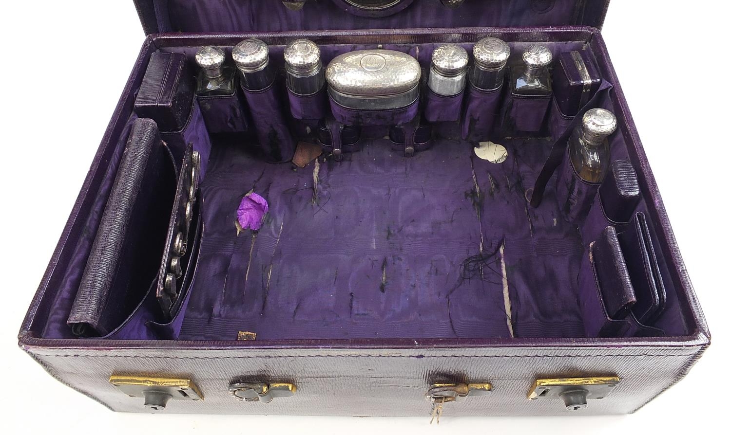 Edwardian purple leather travelling vanity case with silver mounted items including brushes, - Image 5 of 8