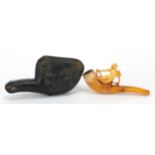 Meerschaum style pipe carved with a nude female housed in a silk and velvet lined case, 11cm in