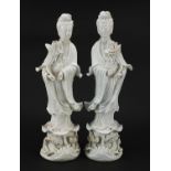 Pair of Chinese porcelain figures of Guanyin having blanc de chine glazes, the largest 43.5cm high