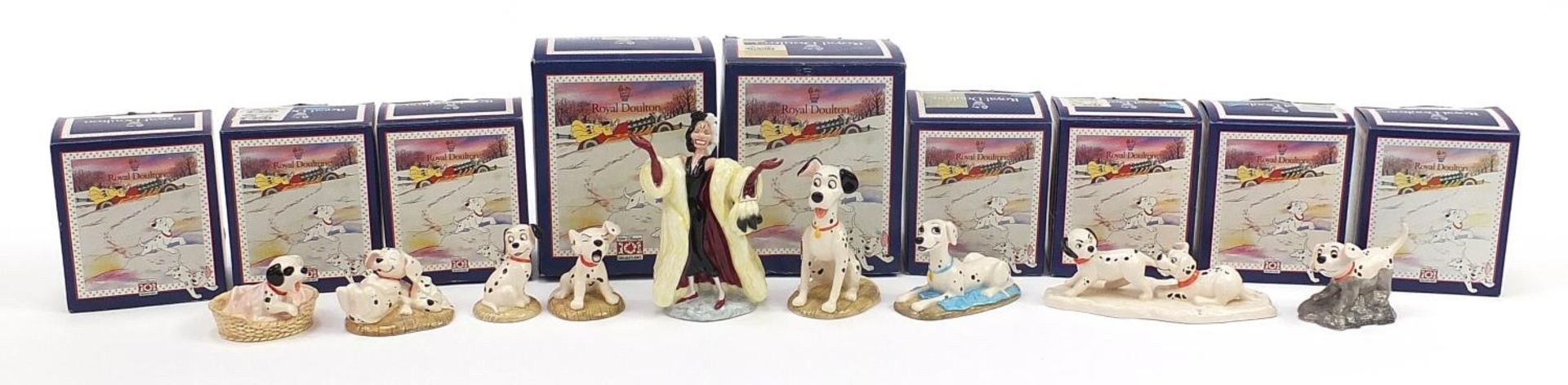 Nine Royal Doulton 101 Dalmatians Disney figures with boxes including Cruella Deville and Lucky &