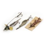 Three vintage Hardy Bros metal fishing lures, the largest numbered 15552?, 7.5cm in length